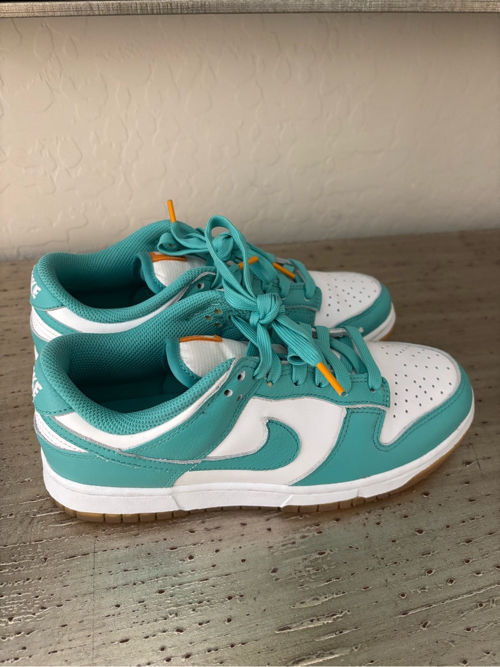 Nike Women's Teal and White Low-Top Sneakers with Orange Accents